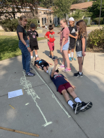 Students measuring wingspan