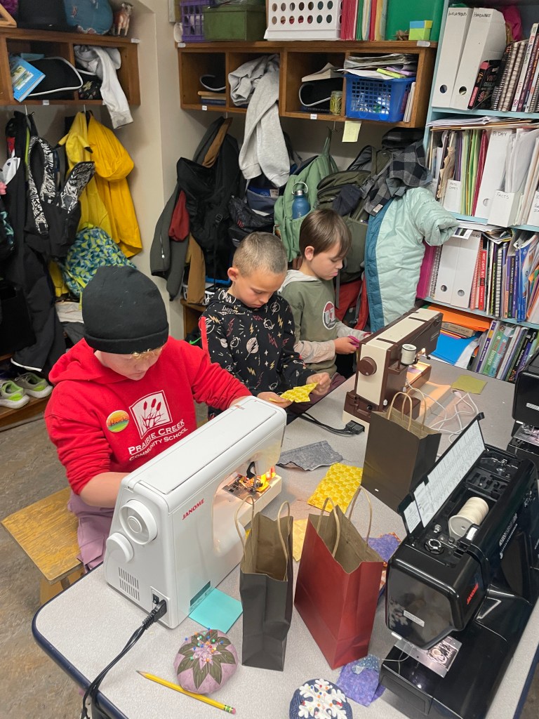 Students at sewing machines